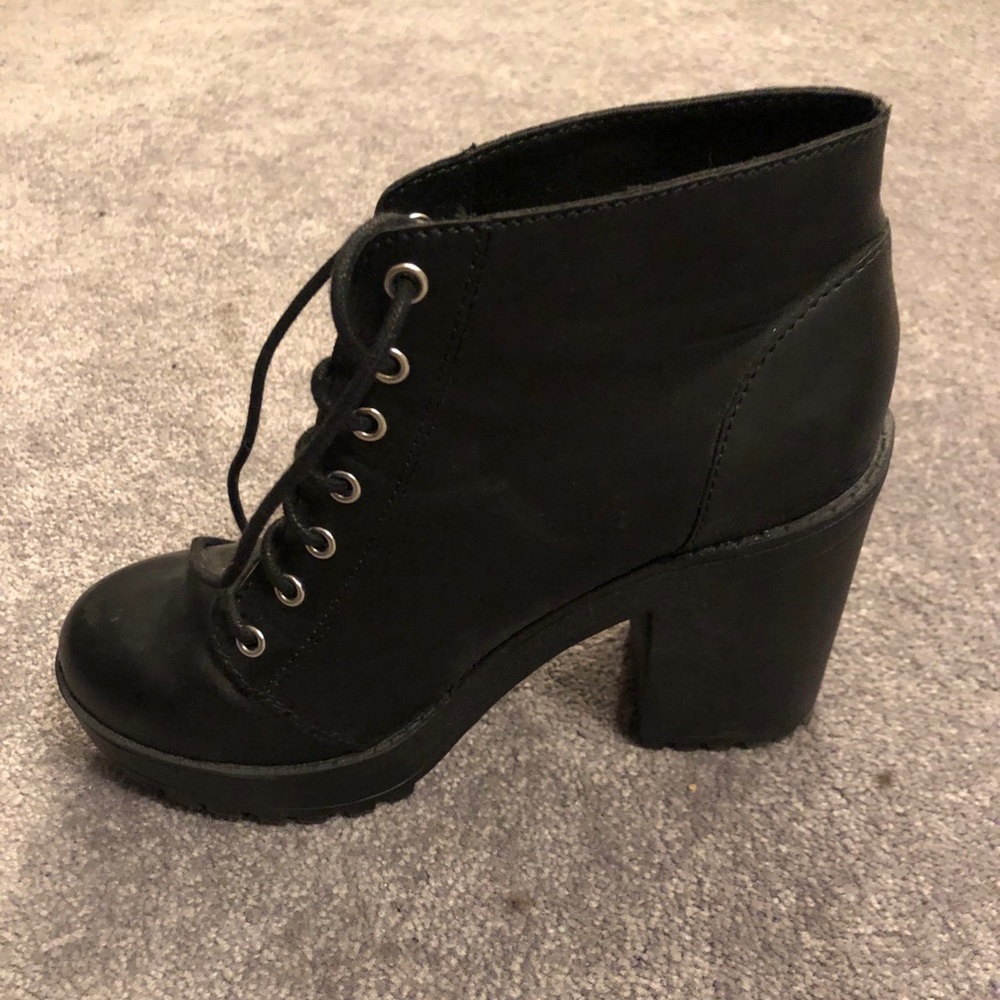 Divided black platform boot heels